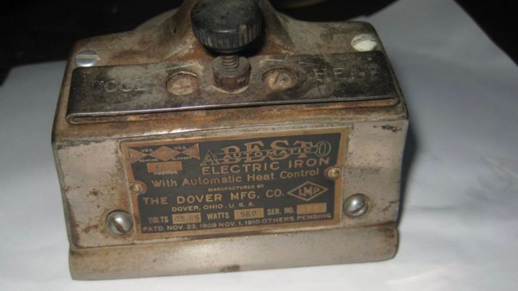 a close up of a vintage electric iron best automatic