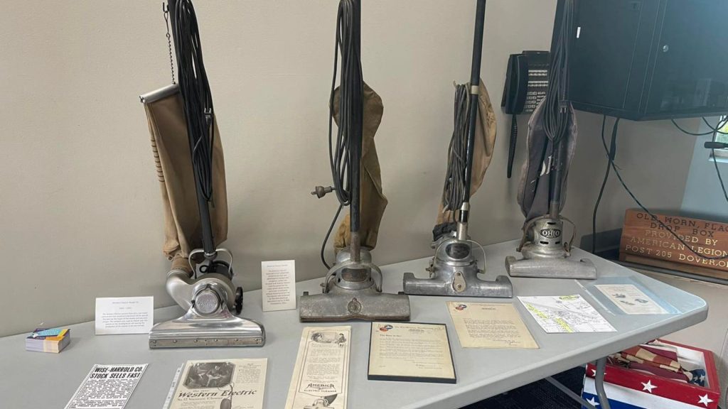 vintage sweepers on display at museum