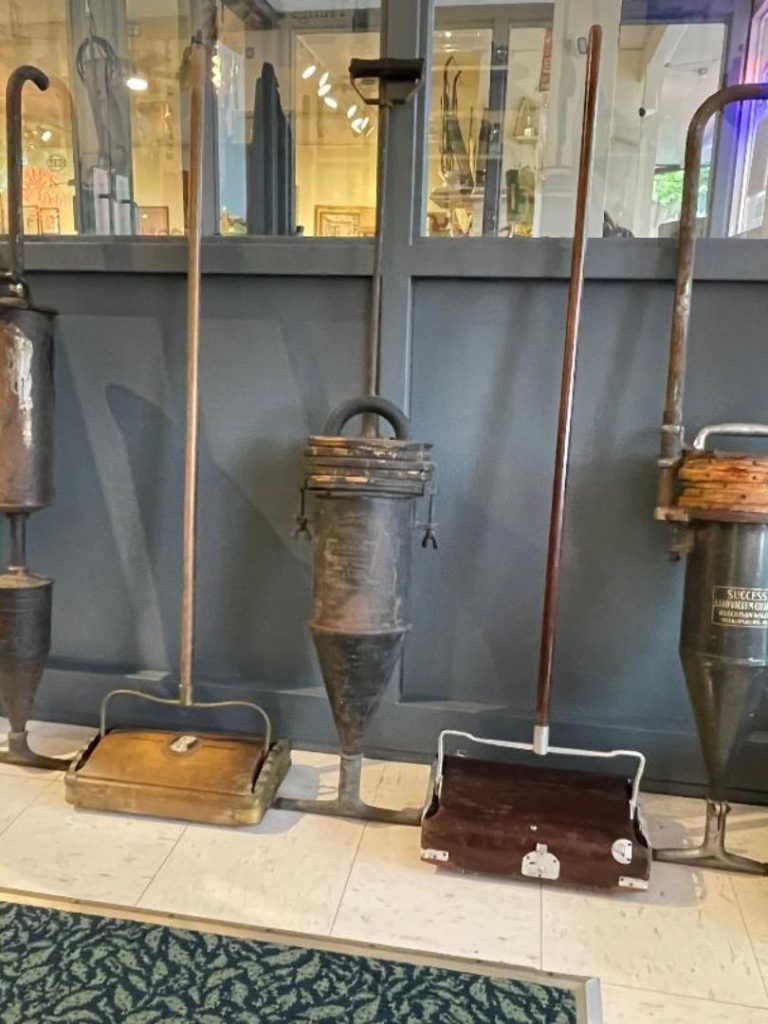 a group of Vintage Pneumatic Vacuums